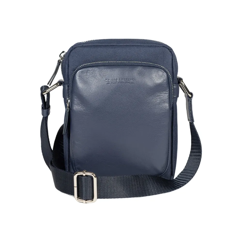 RB2002D | Nylon/Genuine Leather Shoulder Bag, with light grain. Zip closure and adjustable shoulder strap - Color Blue - Dimensions: cm 15.5 x 21 x 7. Packaging: Non-woven fabric bag